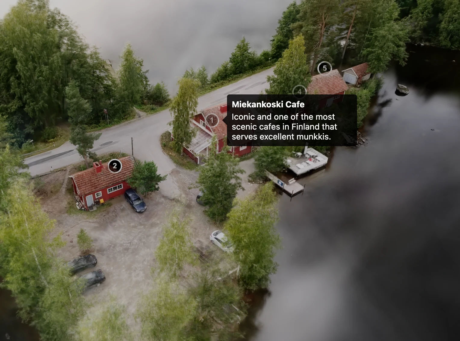Interactive aerial scene over Miekankosken Kahvila, with location markers visible in the splat.