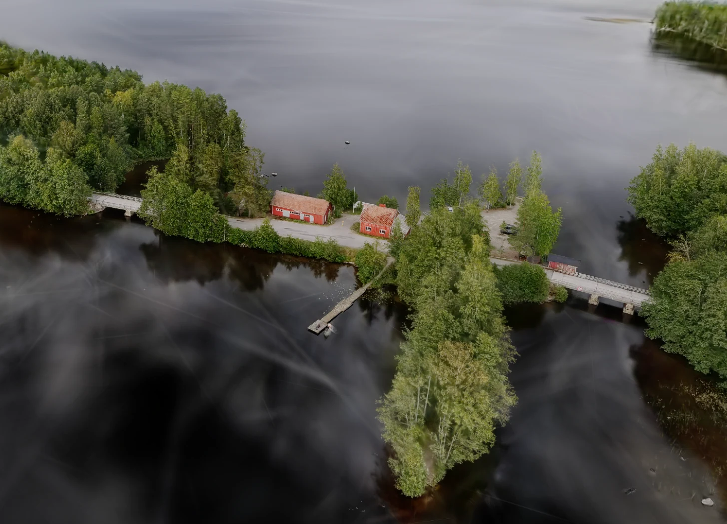 The Miekankoski buildings and bridge viewed across the surrounding waterways.