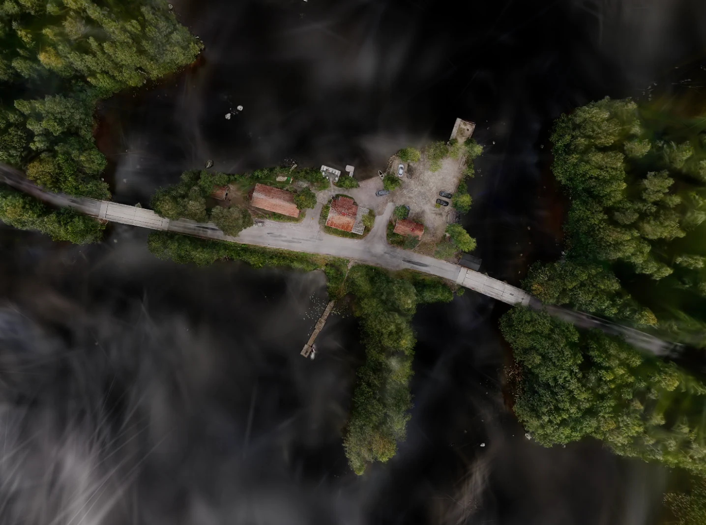 Overhead view of Miekankoski, its bridge and waterfront buildings.