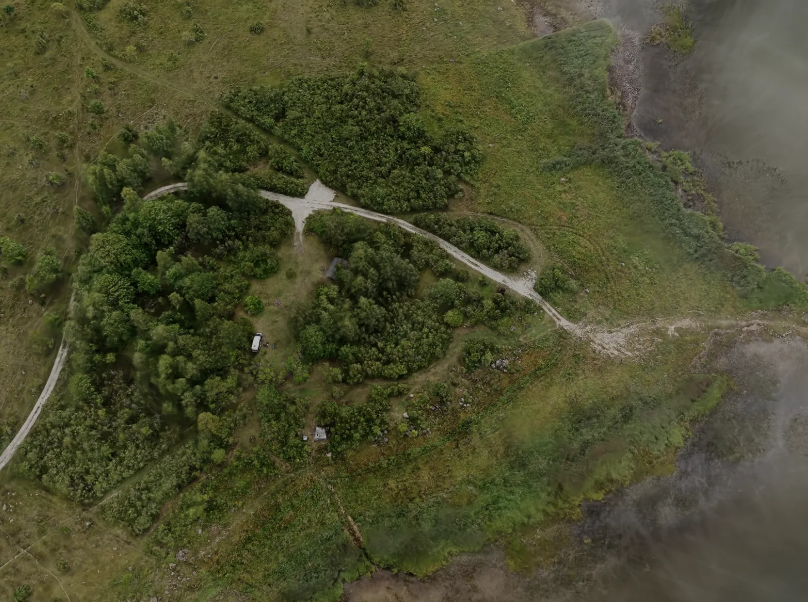 Overhead Gaussian splat view of Oosaare Telkimisplats beside the Estonian coast.