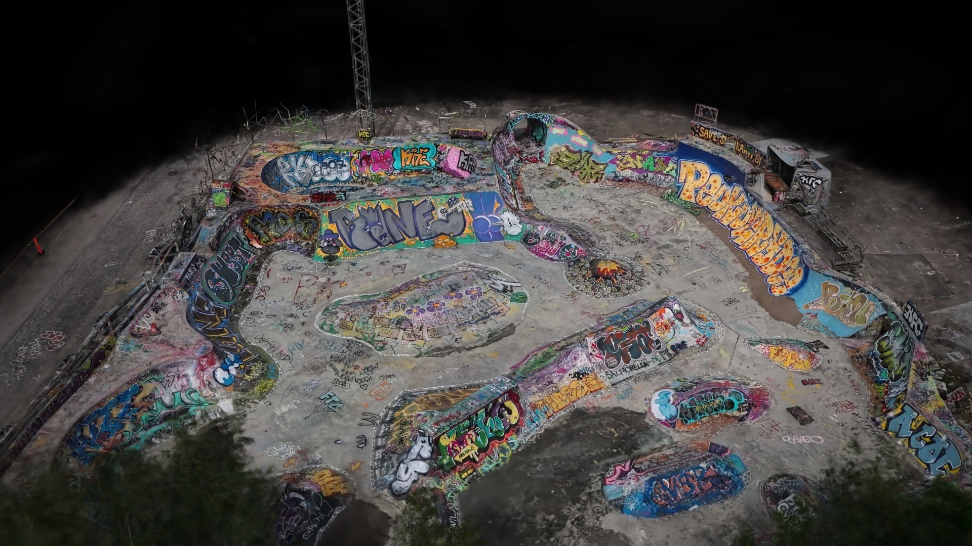 Aerial 3D Gaussian splat of the Suvilahti DIY skatepark in Helsinki covered in graffiti