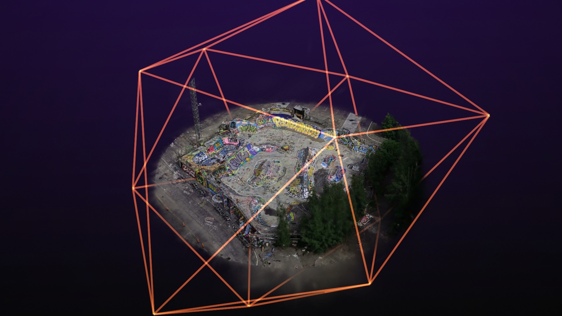 A glowing orange icosahedron wireframe surrounding an aerial skatepark Gaussian splat