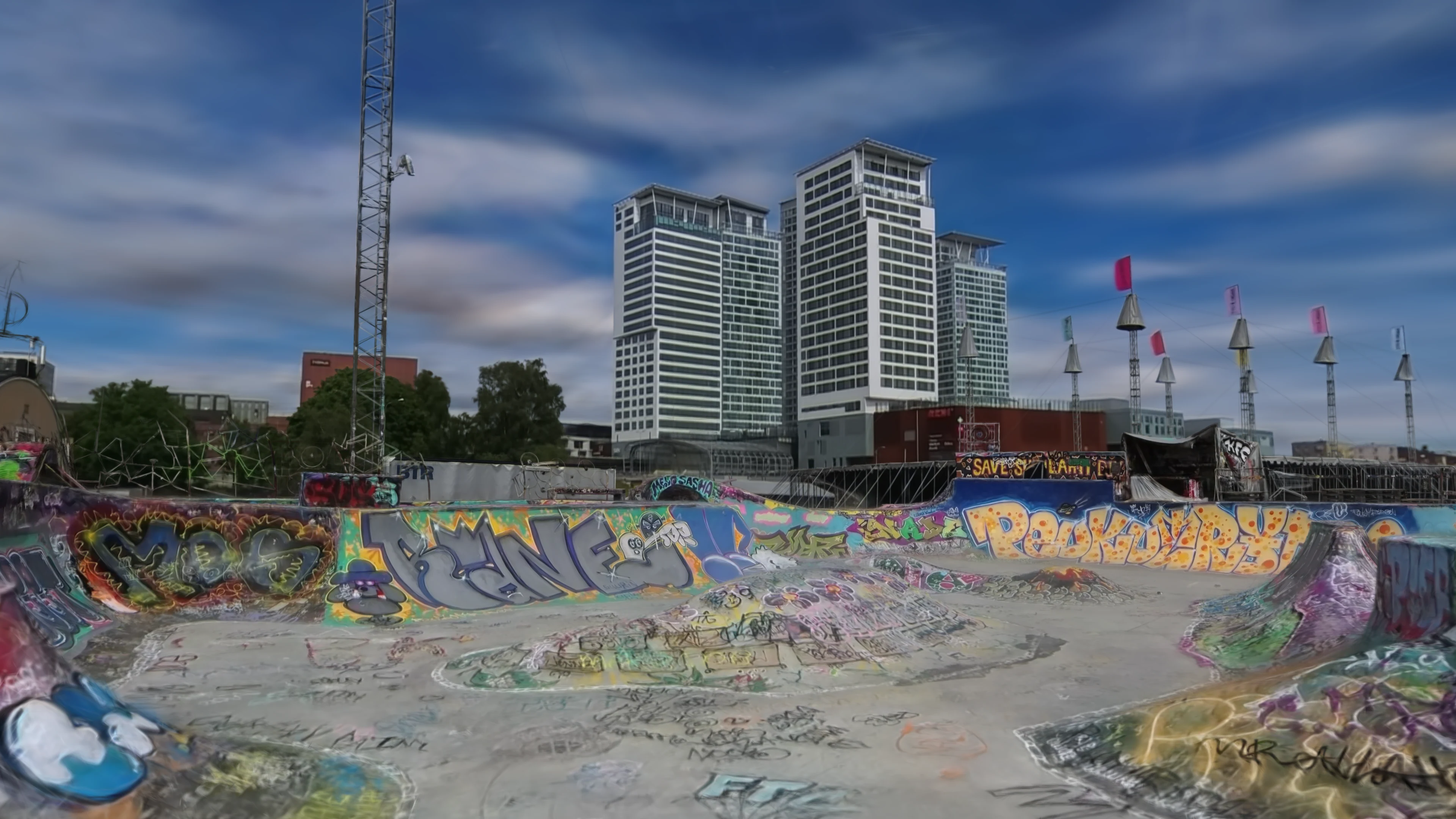 Still render of Suvilahti DIY 3DGS model, Kalasatama high rise buildings in the background.